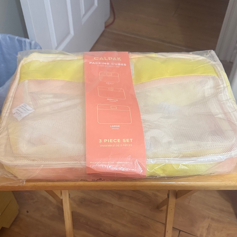 Calpak Yellow and Cream Packing Cubes Set